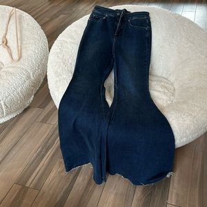 We are the free size 27 super bellbottoms jeans